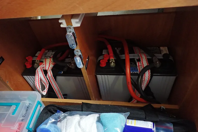 Slide: The Image of Batteries in a 2018 Jeanneau Sun Odyssey 389 sailboat compartment. - 184