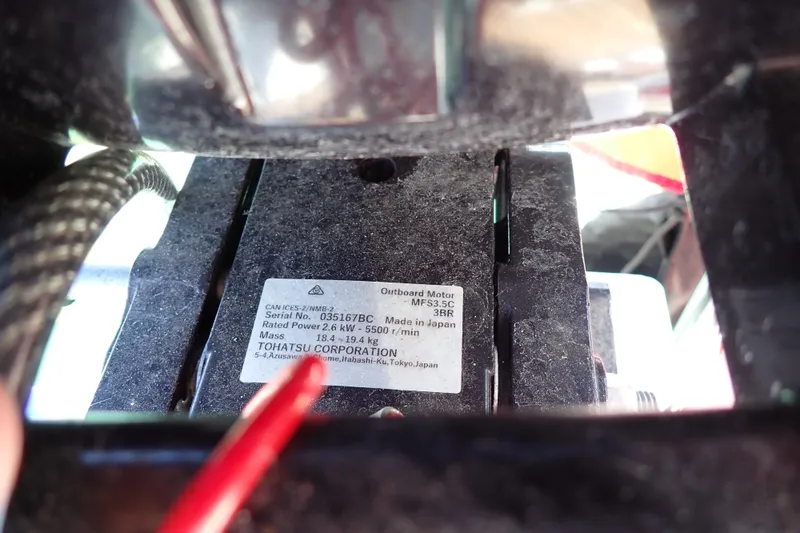 Slide: The Image of Close-up of Tohatsu outboard motor label on Jeanneau Sun Odyssey 389, 2018 model. - 186