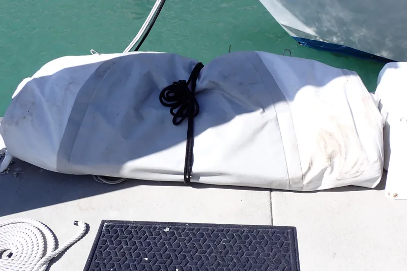Slide: The Image of Wrapped sail on dock near Jeanneau Sun Odyssey 389, 2018 model. - 19