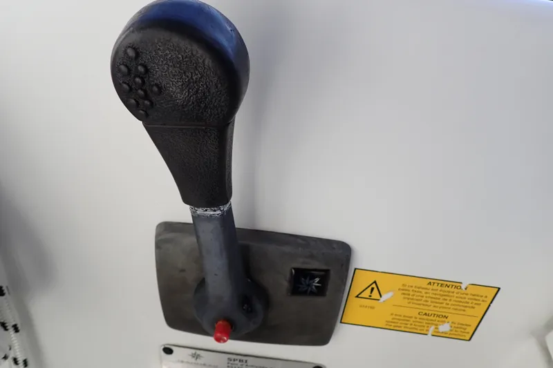 Slide: The Image of Throttle lever on a 2018 Jeanneau Sun Odyssey 389 sailboat control panel. - 26