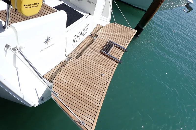 Slide: The Image of 2018 Jeanneau Sun Odyssey 389 yacht with teak swim platform and ladder. - 3