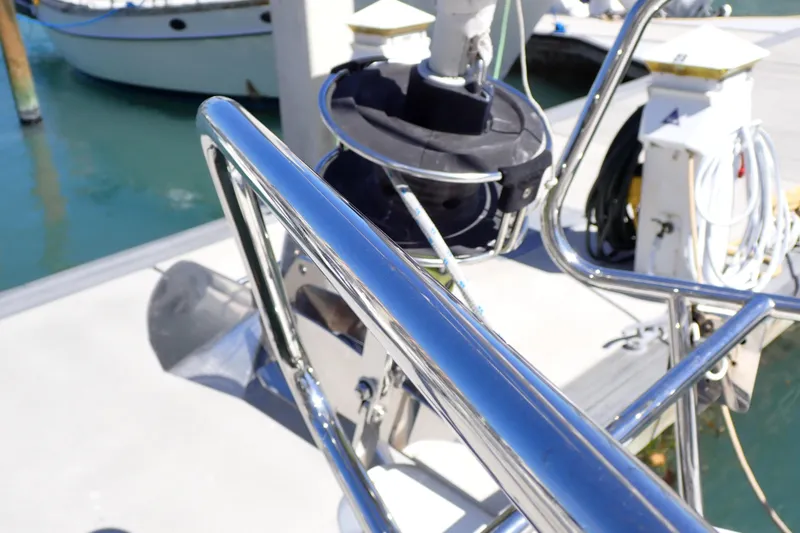 Slide: The Image of Close-up of Jeanneau Sun Odyssey 389 yacht's polished railing, docked at marina, 2018 model. - 39