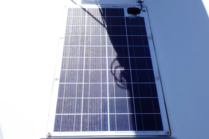 Slide: The Image of Solar panel on Jeanneau Sun Odyssey 389 yacht, 2018 model, partially shaded. - 43