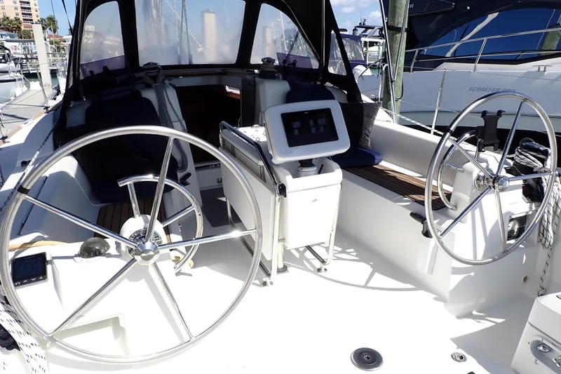Slide: The Image of Cockpit of 2018 Jeanneau Sun Odyssey 389 sailboat with dual steering wheels. - 5