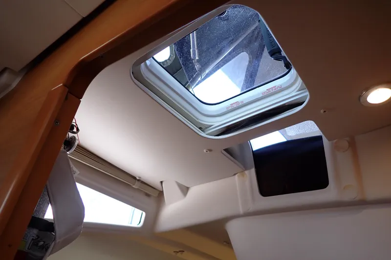 Slide: The Image of Interior view of 2018 Jeanneau Sun Odyssey 389 yacht with open skylight. - 64