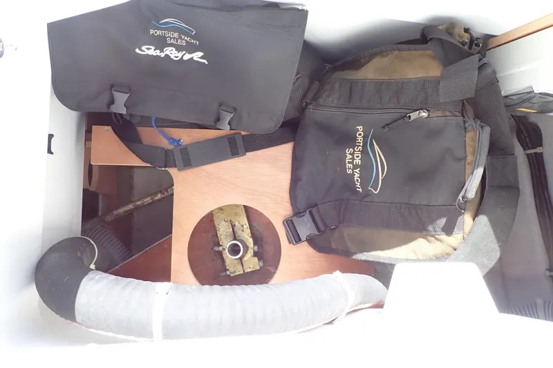 Slide: The Image of Storage compartment of 2018 Jeanneau Sun Odyssey 389 with yacht sales bags. - 78