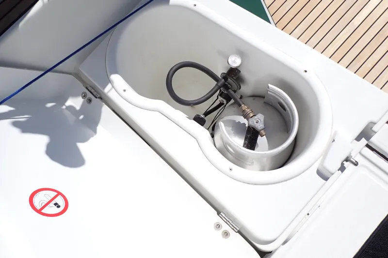 Slide: The Image of Propane storage compartment on 2018 Jeanneau Sun Odyssey 389 sailboat deck. - 83