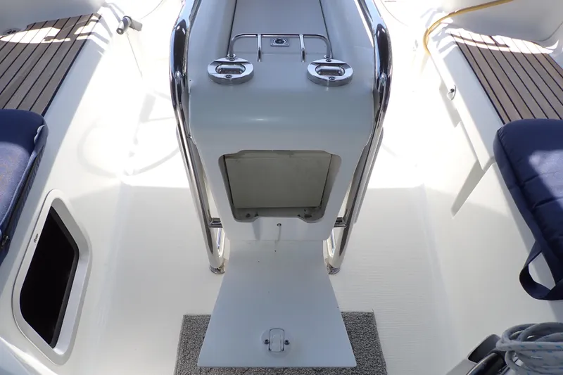 Slide: The Image of Cockpit of 2018 Jeanneau Sun Odyssey 389 sailboat with seating and control panel. - 96
