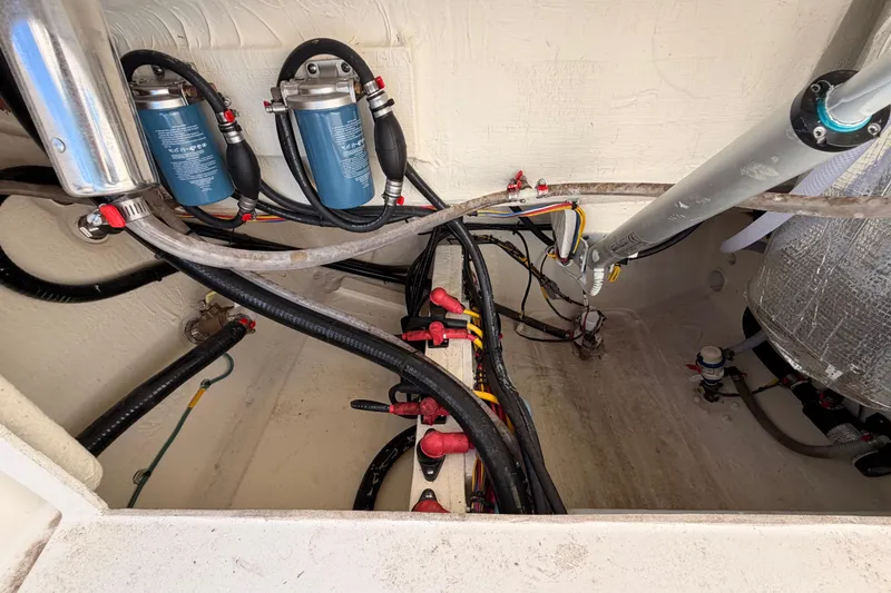 Slide: The Image of 2024 Cobia 262 Center Console boat wiring and fuel system components. - 32