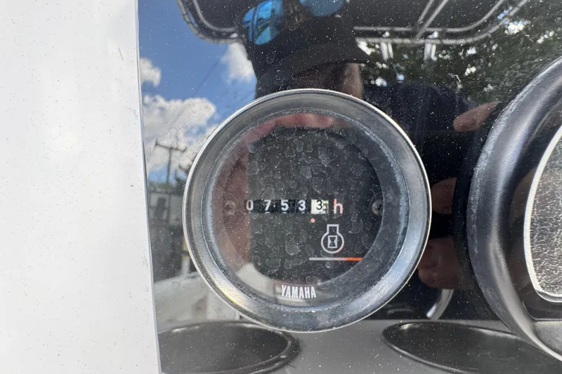 Slide: The Image of Hour meter on 2001 Cobia 254 Center Console, showing 753.3 hours. - 26