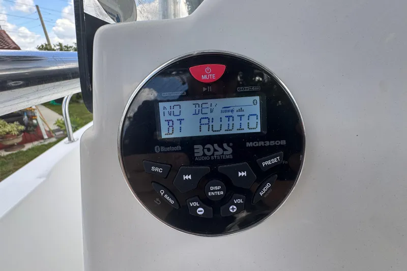 Slide: The Image of Boss Audio Systems MGR350B stereo on 2001 Cobia 254 Center Console boat. - 27