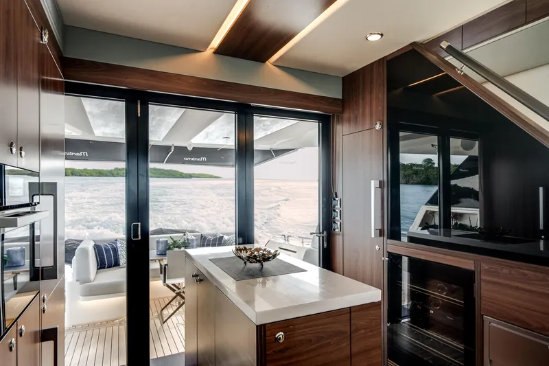 Slide: The Image of Luxurious interior of 2024 Maritimo M55 yacht with ocean view and modern design. - 14