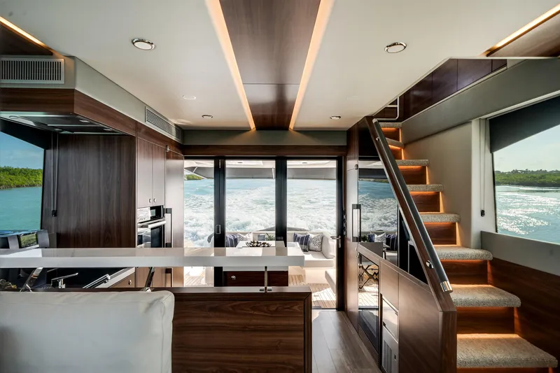 Slide: The Image of Luxurious interior of 2024 Maritimo M55 yacht with modern design and scenic ocean view. - 15