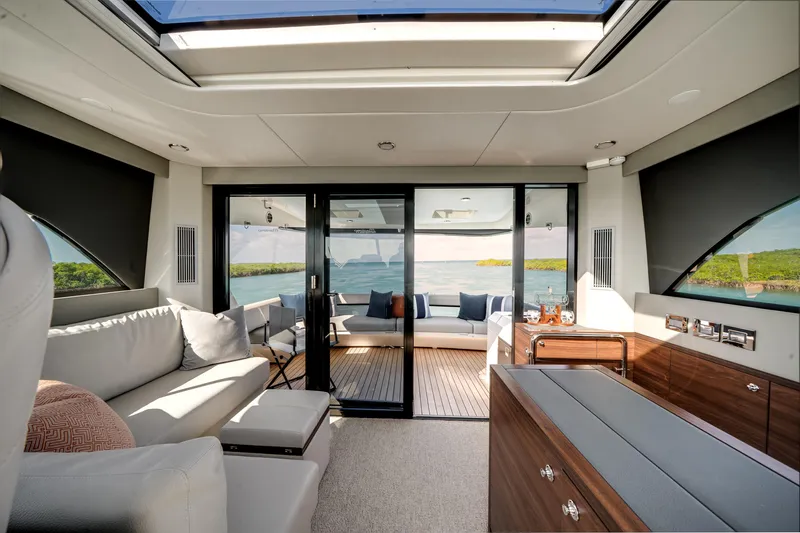 Slide: The Image of Luxurious interior of 2024 Maritimo M55 yacht with ocean view and elegant furnishings. - 28