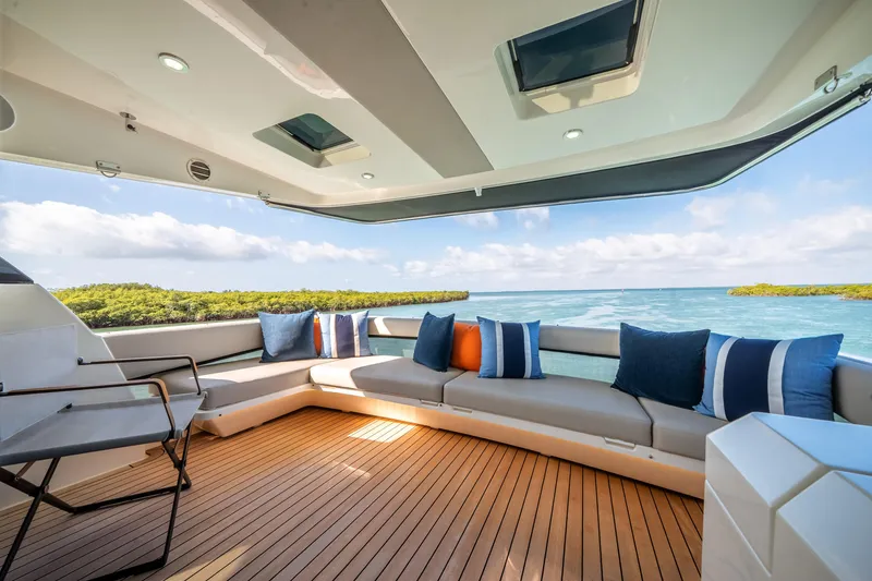 Slide: The Image of Luxurious 2024 Maritimo M55 yacht deck with ocean view and stylish seating. - 32