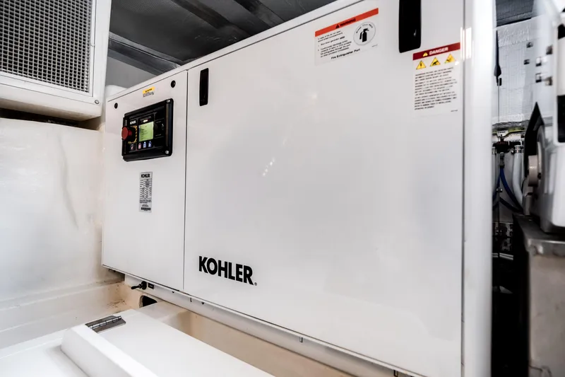 Slide: The Image of Kohler generator in 2024 Maritimo M55 yacht engine room. - 52