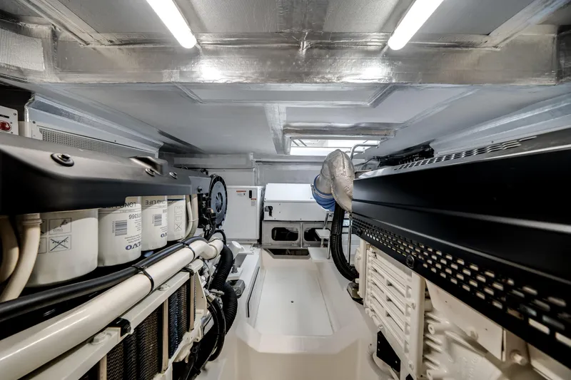Slide: The Image of Engine room of 2024 Maritimo M55 yacht, showcasing advanced machinery and equipment. - 57