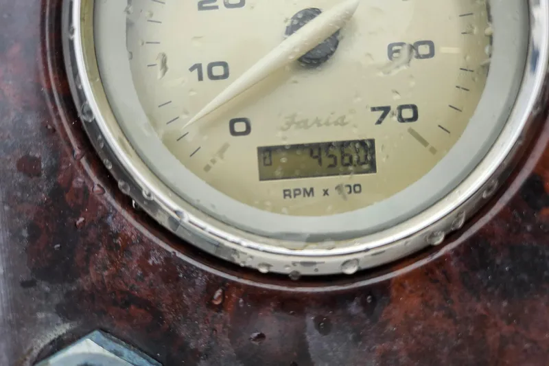 Slide: The Image of Close-up of a 2006 Hurricane SunDeck 237 OB tachometer showing 4560 RPM. - 20