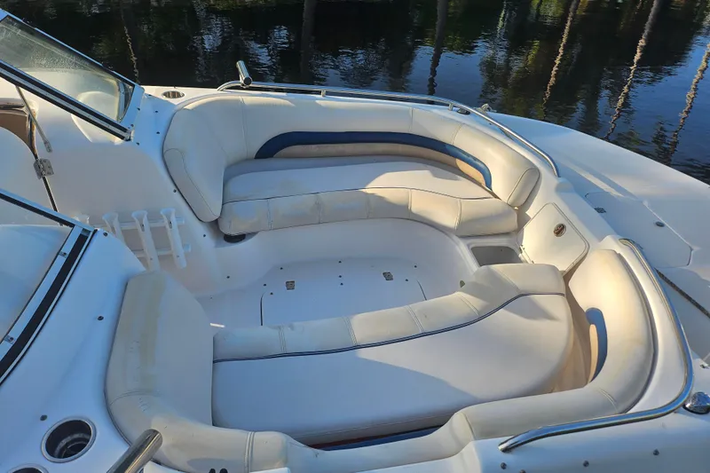 Slide: The Image of 2006 Hurricane SunDeck 237 OB boat interior with spacious seating and elegant design. - 30