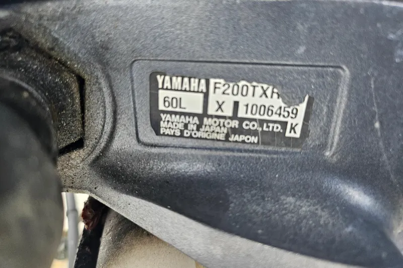 Slide: The Image of Yamaha F200TXR engine label on 2006 Hurricane SunDeck 237 OB boat. - 8