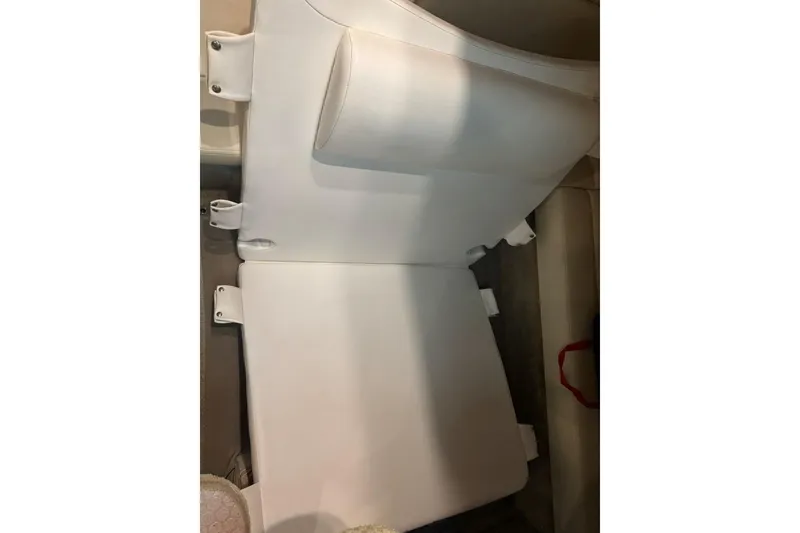 Slide: The Image of 2005 Sea Ray 340 Sundancer interior seating with white upholstery. - 37