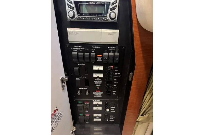Slide: The Image of Electrical control panel on a 2005 Sea Ray 340 Sundancer boat. - 38