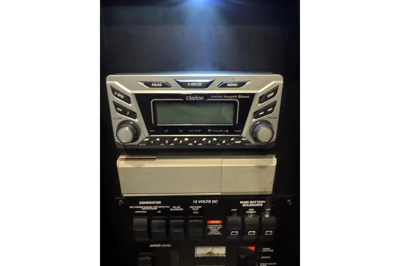 Slide: The Image of Clarion stereo system on 2005 Sea Ray 340 Sundancer control panel. - 39