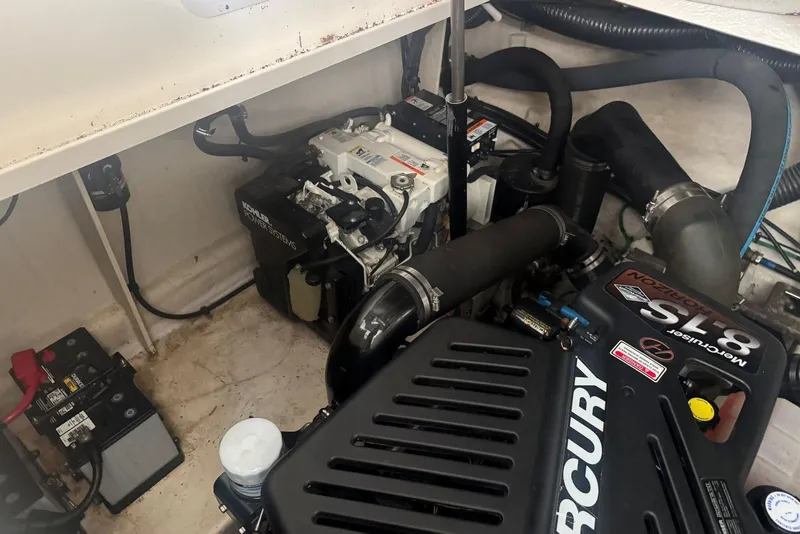 Slide: The Image of Engine compartment of a 2005 Sea Ray 340 Sundancer with Mercury and Kohler systems. - 41