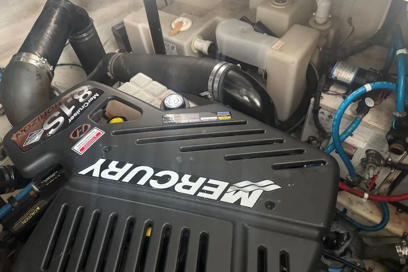 Slide: The Image of Engine compartment of a 2005 Sea Ray 340 Sundancer with Mercury 8.1S motor. - 42