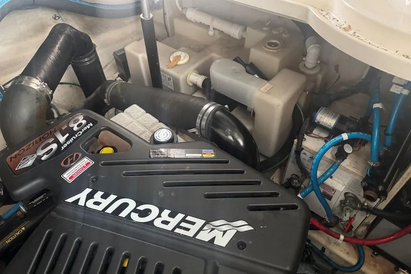 Slide: The Image of Engine compartment of a 2005 Sea Ray 340 Sundancer with Mercury 8.1S motor. - 44
