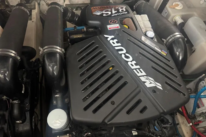 Slide: The Image of Mercury engine in 2005 Sea Ray 340 Sundancer boat, showcasing powerful marine performance. - 45