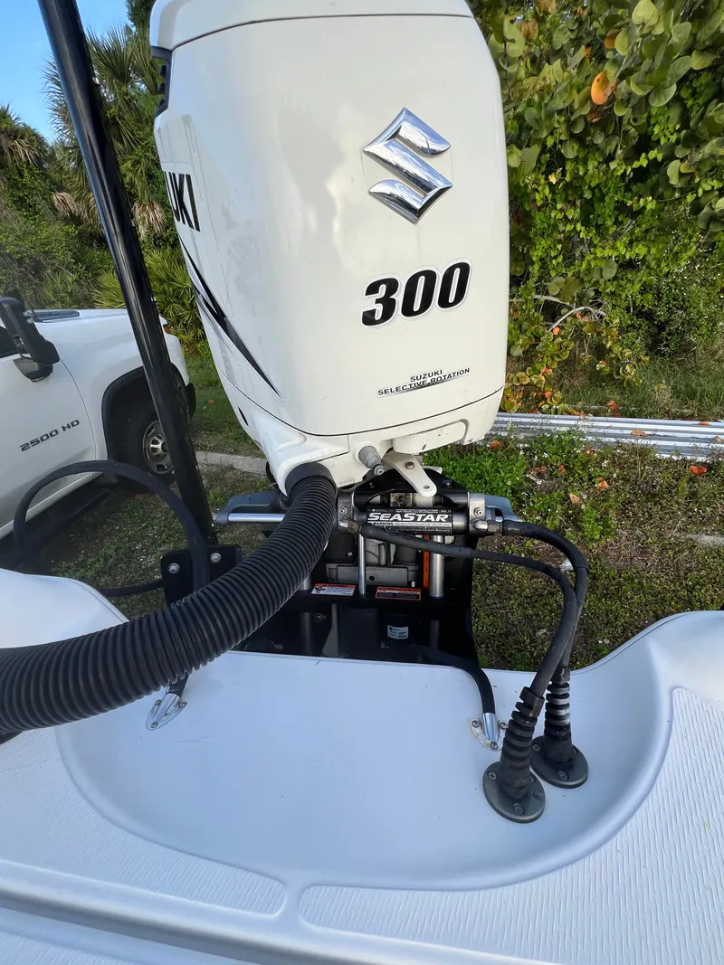 Slide: The Image of Suzuki 300 outboard motor on Blue Wave 2400 PureBay boat, year 2016. - 12