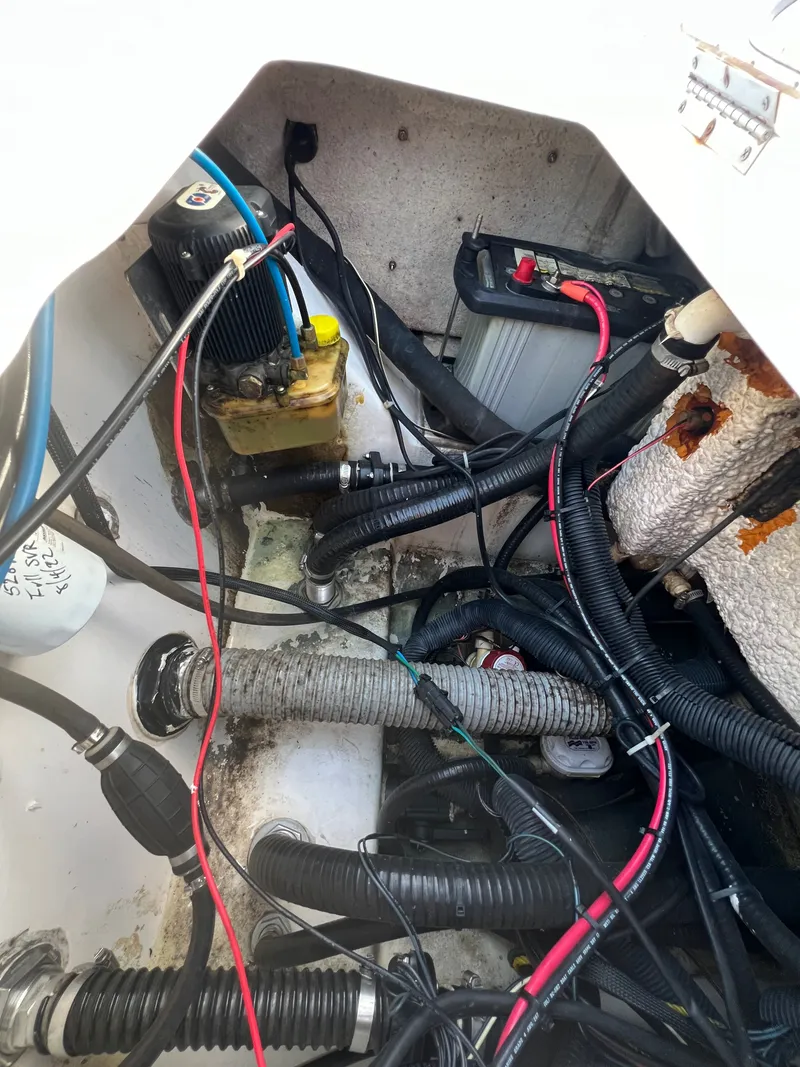 Slide: The Image of Interior view of a 2016 Blue Wave 2400 PureBay boat engine. - 14