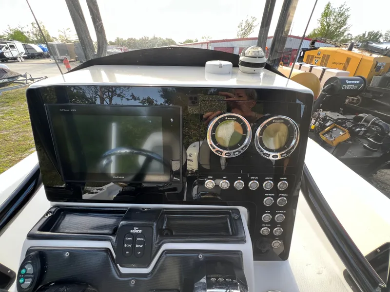 Slide: The Image of Dashboard of a 2016 Blue Wave 2400 PureBay boat. - 25
