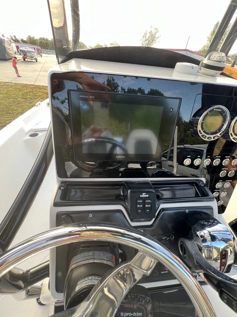 Slide: The Image of Dashboard of a 2016 Blue Wave 2400 PureBay boat. - 27
