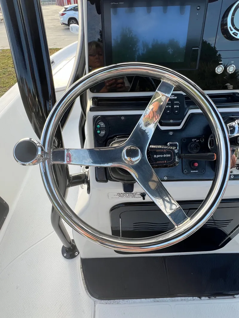 Slide: The Image of Steering console of a 2016 Blue Wave 2400 PureBay boat. - 28