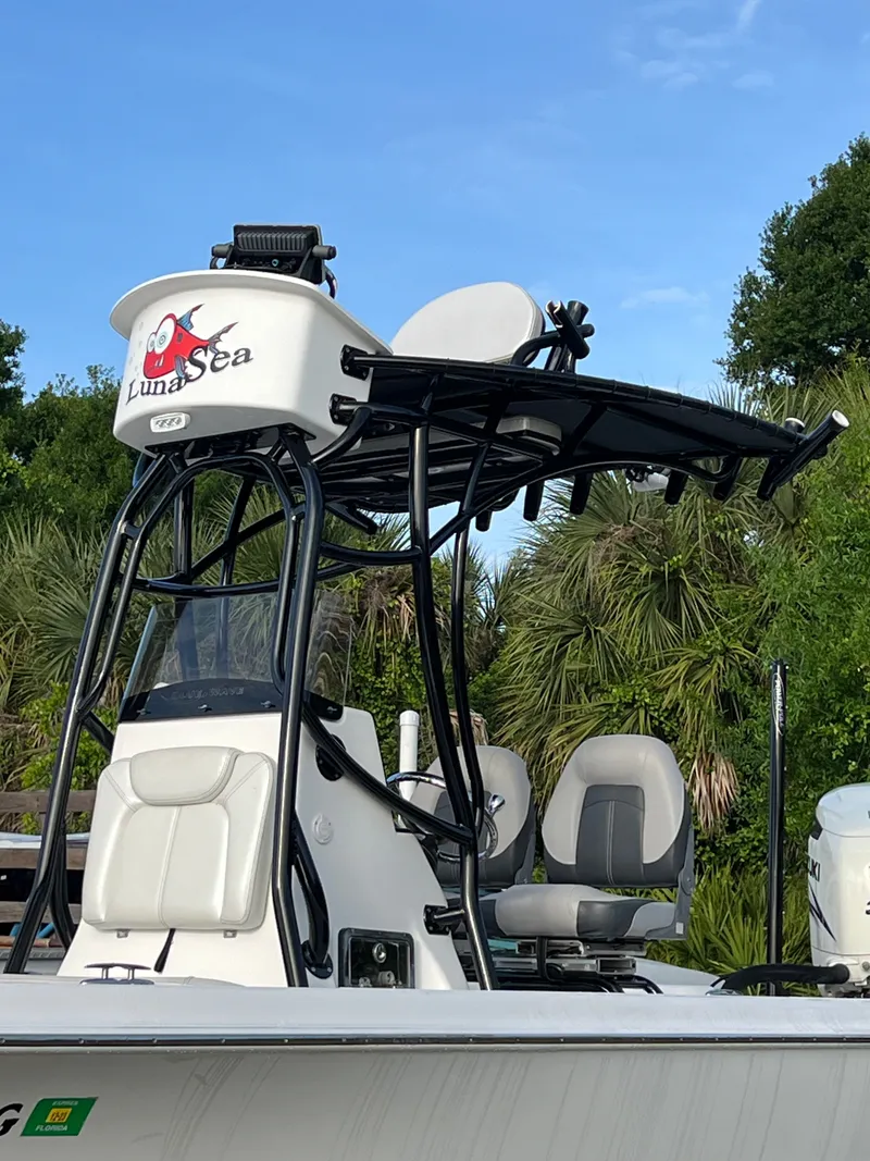 Slide: The Image of 2016 Blue Wave 2400 PureBay boat with elevated seating area. - 4