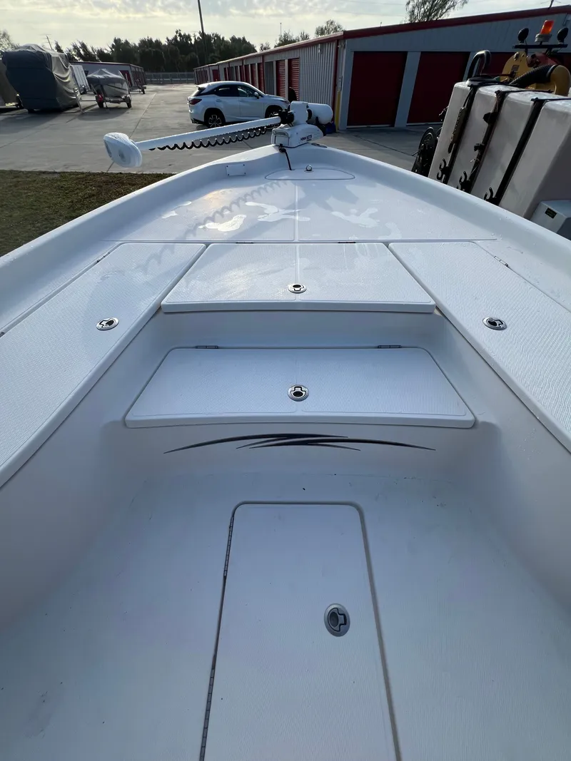 Slide: The Image of 2016 Blue Wave 2400 PureBay boat deck in a storage area. - 45