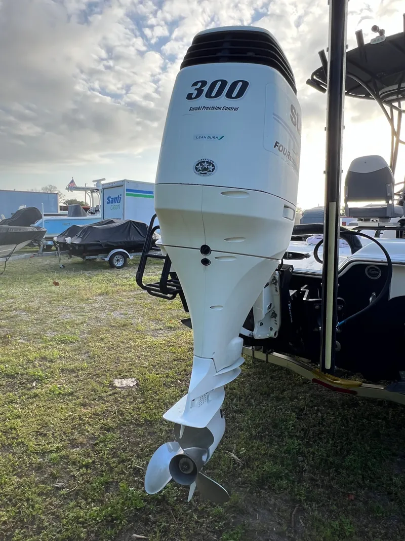 Slide: The Image of Outboard motor on a 2016 Blue Wave 2400 PureBay boat. - 6