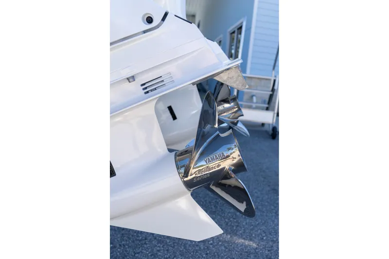 Slide: The Image of Close-up of Yamaha Reliance Series propeller on 2026 Sportsman Open 252 Center Console boat. - 10