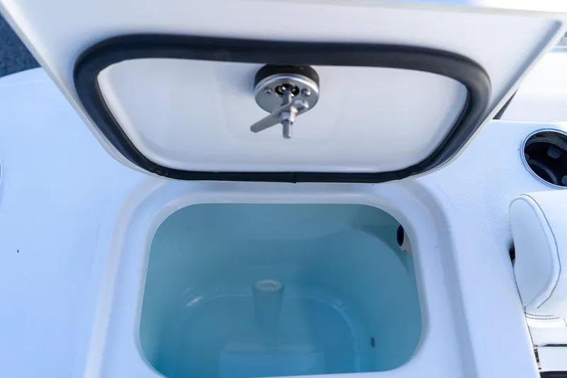 Slide: The Image of Livewell compartment on 2026 Sportsman Open 252 Center Console boat. - 19
