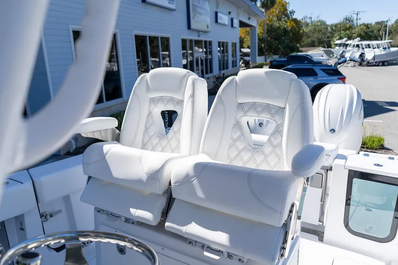 Slide: The Image of 2026 Sportsman Open 252 Center Console with luxurious white seating and modern design. - 34