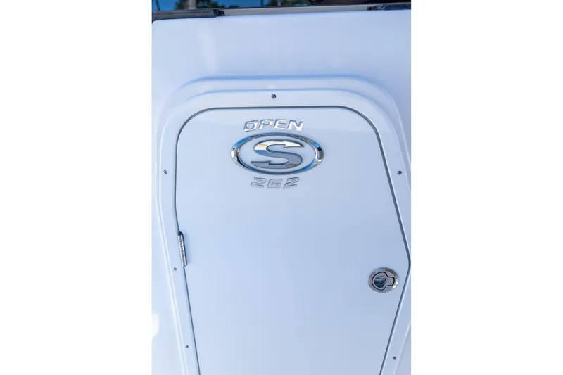 Slide: The Image of 2026 Sportsman Open 252 Center Console boat door with logo and emblem. - 36