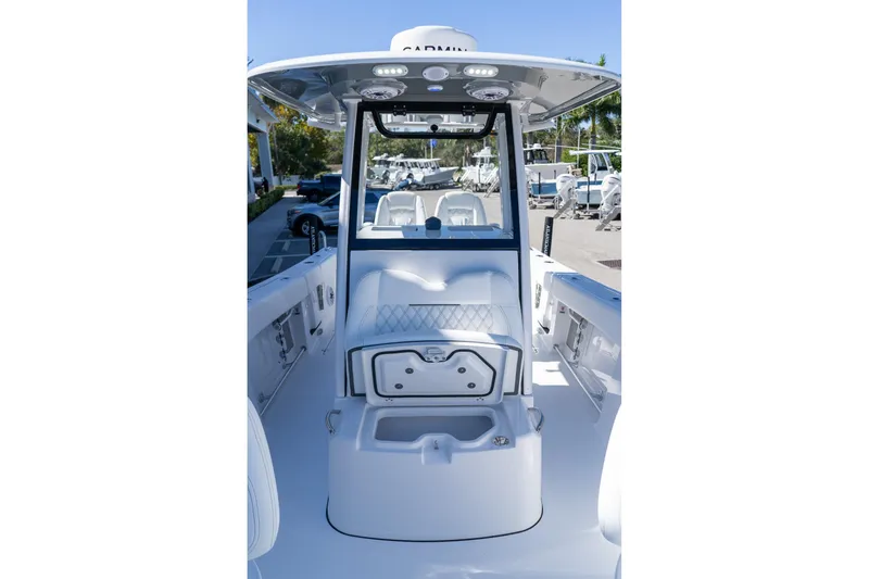 Slide: The Image of 2026 Sportsman Open 252 Center Console boat interior with seating and storage. - 44