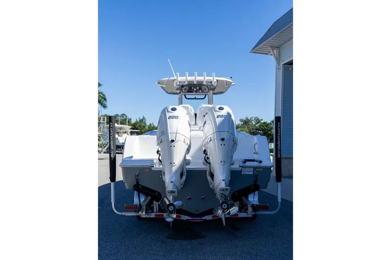 Slide: The Image of 2026 Sportsman Open 252 Center Console boat with dual 200 horsepower engines. - 9