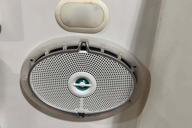 Slide: The Image of Oval speaker on a 2004 Formula 260 Bowrider boat interior. - 21