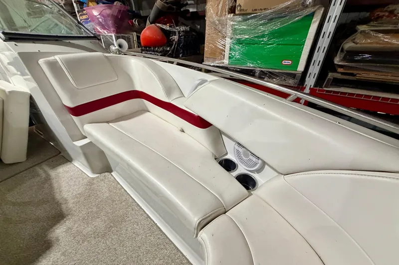 Slide: The Image of 2004 Formula 260 Bowrider interior with white seating and red accent stripe. - 25