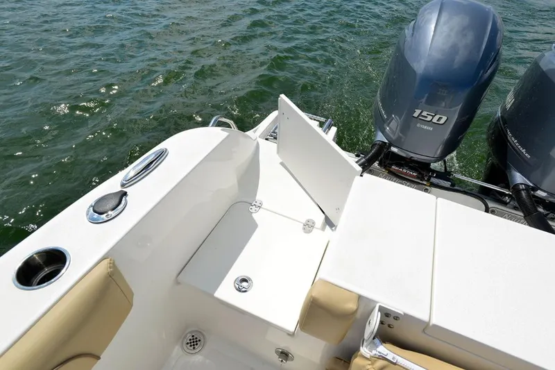 Slide: The Image of Manufacturer Provided Image: 2020 NauticStar 25 XS Offshore boat with twin Yamaha 150 engines on water. - 15