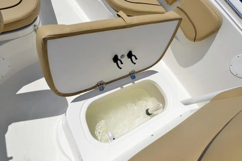 Slide: The Image of Manufacturer Provided Image: 2020 NauticStar 25 XS Offshore boat with open storage compartment. - 16