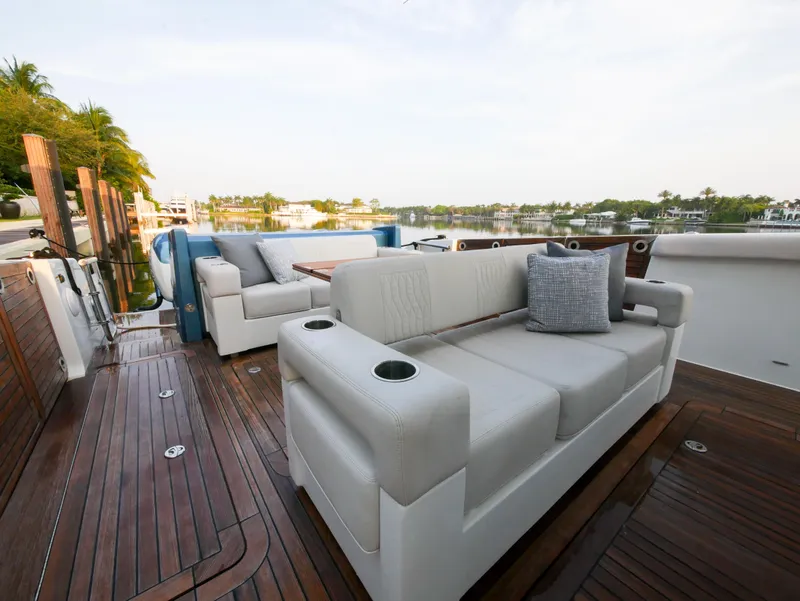 Slide: The Image of Luxurious seating on 2020 Ocean Alexander 45 Divergence Sport yacht with scenic waterfront view. - 13